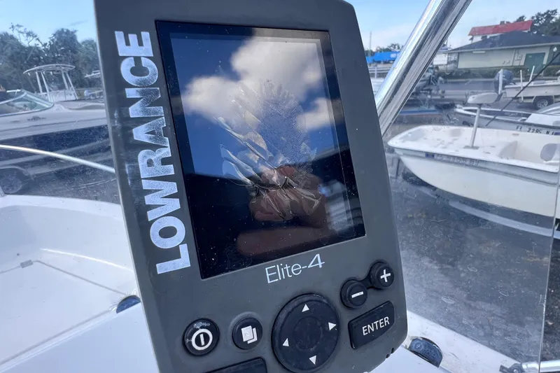 Slide: The Image of Lowrance Elite-4 fishfinder on 2005 Sea Fox 197 Center Console boat. - 26