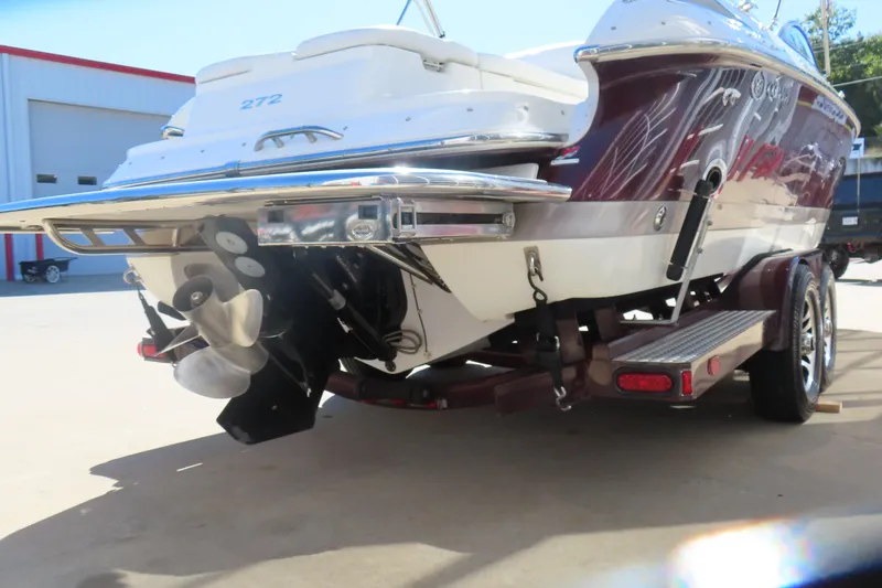 Slide: The Image of 2005 Cobalt 272 boat on trailer, rear view showing propeller and hull design. - 10