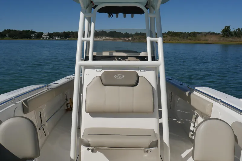 Slide: The Image of 2021 Key West 244 Center Console boat dashboard with navigation system and controls. - 9