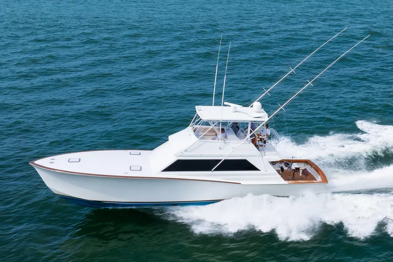 Slide: The Image of 1972 Jim Smith Custom Convertible yacht cruising on open water. - 11