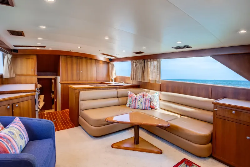 Slide: The Image of Luxurious 1972 Jim Smith Custom Convertible yacht interior with elegant wood finishes and ocean view. - 12