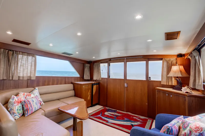 Slide: The Image of Luxurious 1972 Jim Smith Custom Convertible yacht interior with ocean view and elegant furnishings. - 14