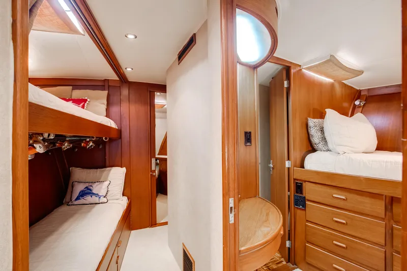 Slide: The Image of 1972 Jim Smith Custom Convertible yacht interior with wooden bunk beds and cozy decor. - 16
