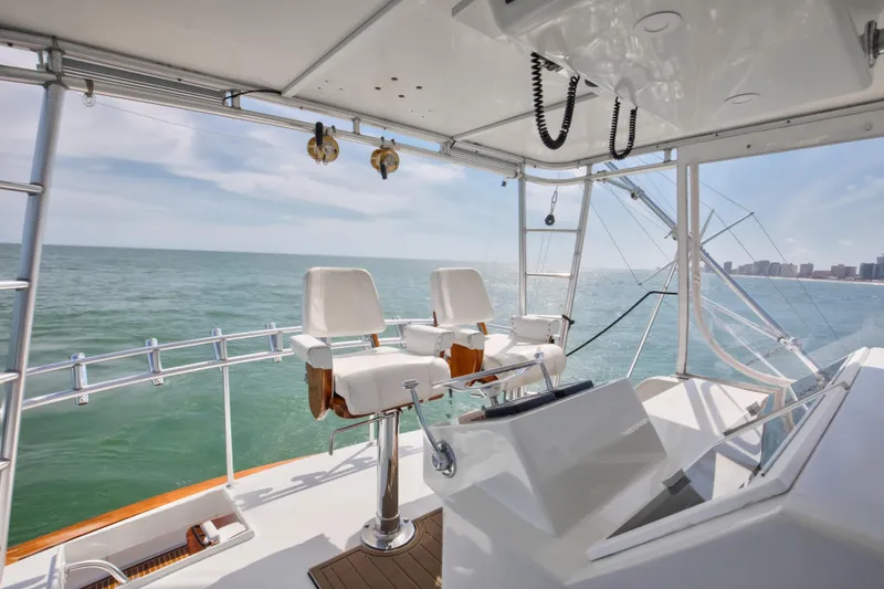 Slide: The Image of Helm of 1972 Jim Smith Custom Convertible yacht with ocean view. - 30
