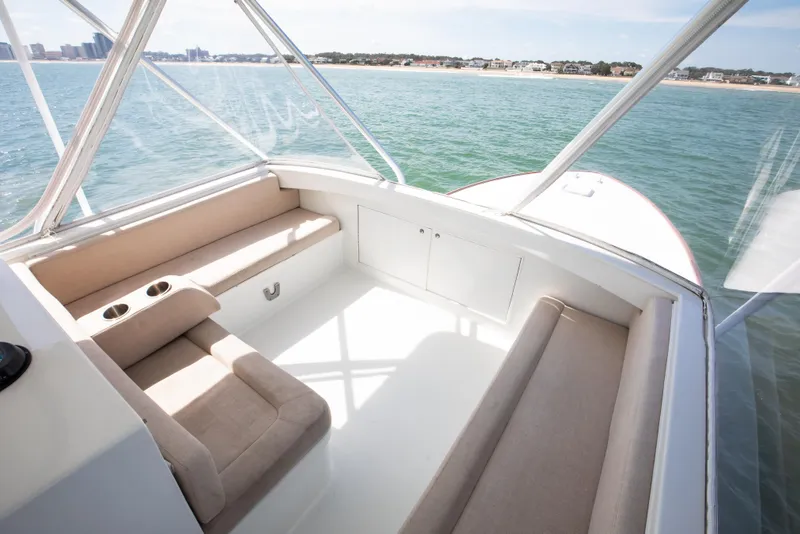 Slide: The Image of Luxurious 1972 Jim Smith Custom Convertible boat interior with beige seating and ocean view. - 31