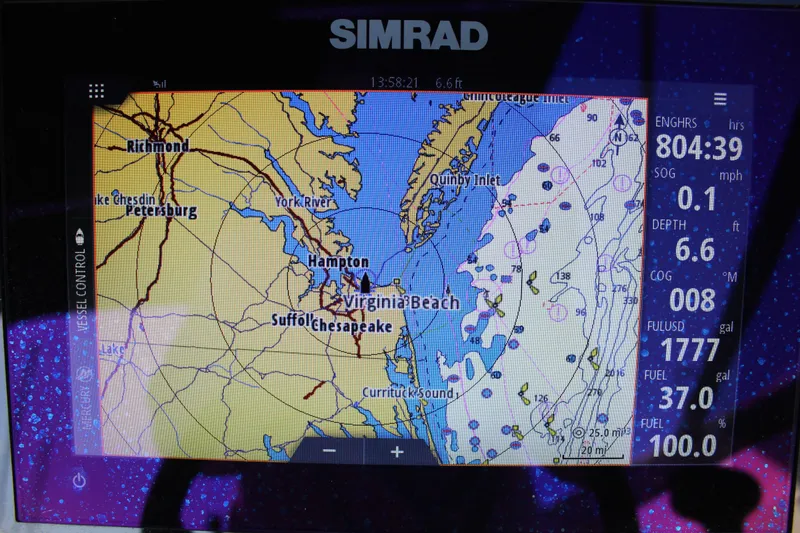 Slide: The Image of Simrad navigation display on 2023 Sea Ray SPX 210, showing Virginia Beach area map. - 17