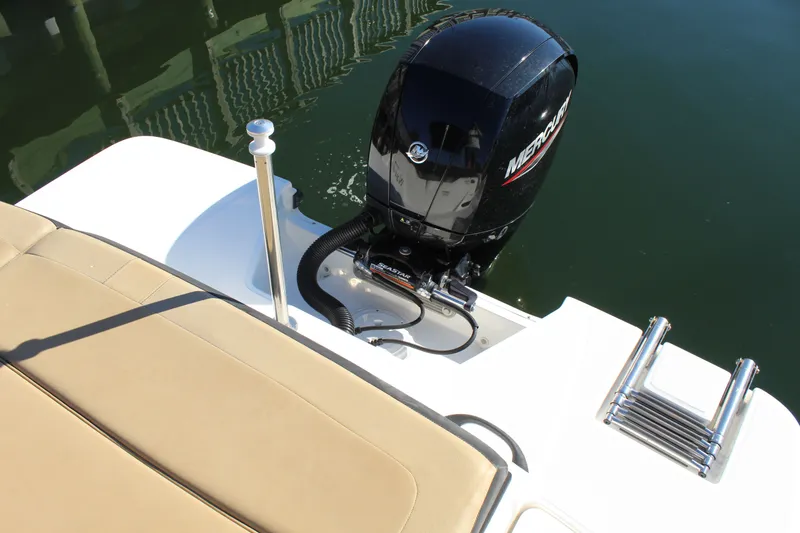 Slide: The Image of 2023 Sea Ray SPX 210 boat with Mercury outboard motor and swim platform. - 21