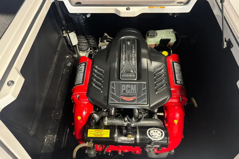 Slide: The Image of 2015 Nautique Super Air Nautique G23 engine compartment with PCM marine engine. - 11