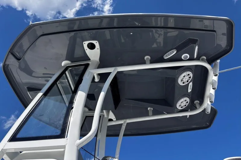 Slide: The Image of 2026 Tidewater 2300 Carolina Bay boat interior with dual seating and steering console. - 20