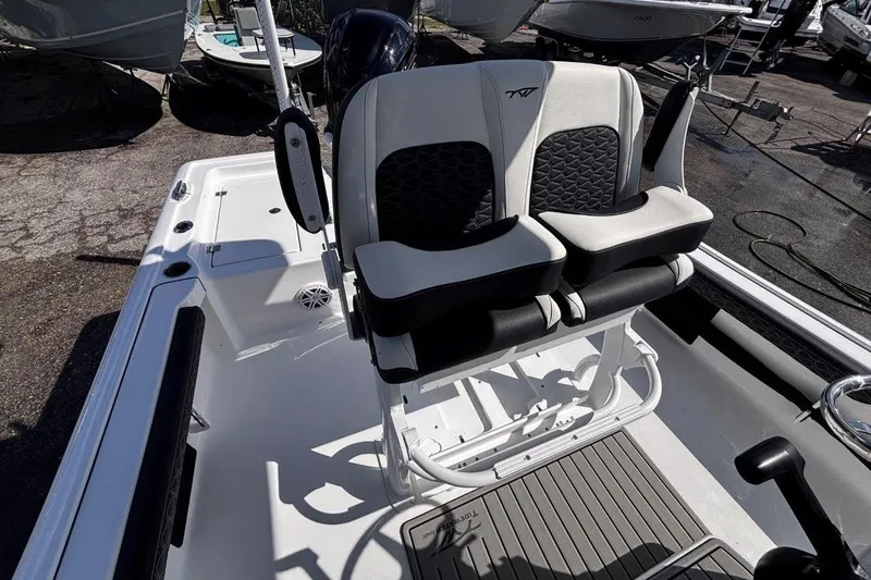 Slide: The Image of Control panel of 2026 Tidewater 2300 Carolina Bay boat with labeled buttons. - 23