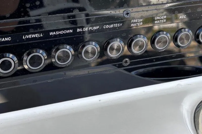 Slide: The Image of 2026 Tidewater 2300 Carolina Bay boat console with Garmin navigation system. - 27