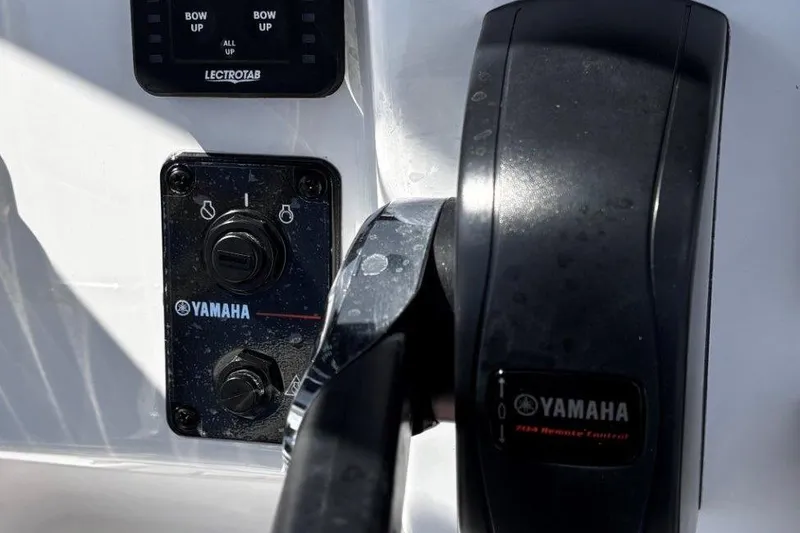 Slide: The Image of 2026 Tidewater 2300 Carolina Bay boat interior with steering console and seating. - 28