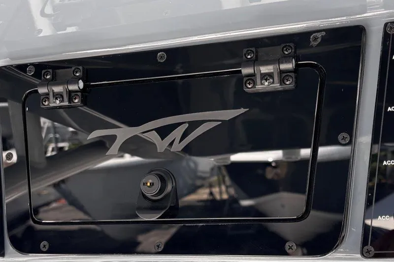 Slide: The Image of 2026 Tidewater 2300 Carolina Bay boat interior with seating and control panel. - 29