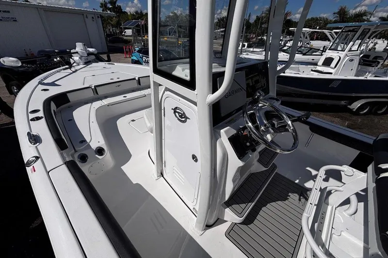Slide: The Image of Open storage compartment on 2026 Tidewater 2300 Carolina Bay boat. - 32