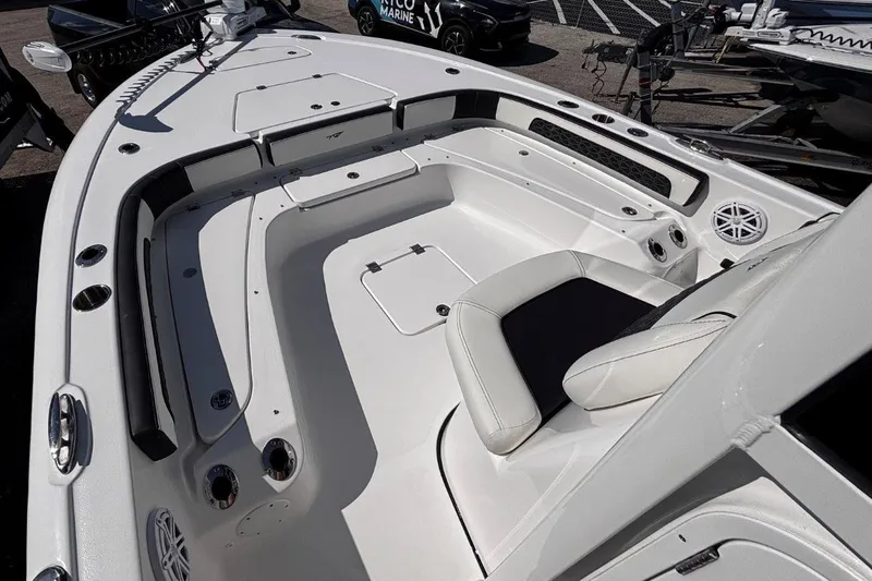 Slide: The Image of 2026 Tidewater 2300 Carolina Bay boat with open storage compartments. - 34
