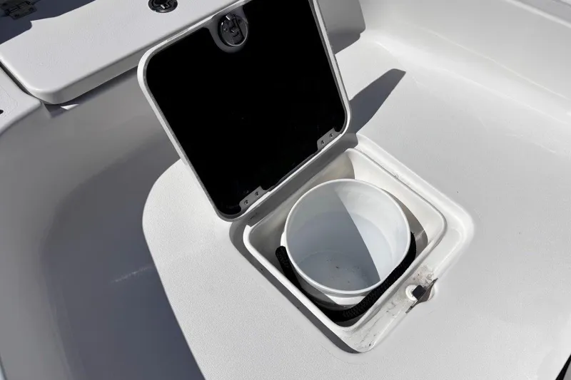 Slide: The Image of 2026 Tidewater 2300 Carolina Bay boat storage compartments and deck details. - 36