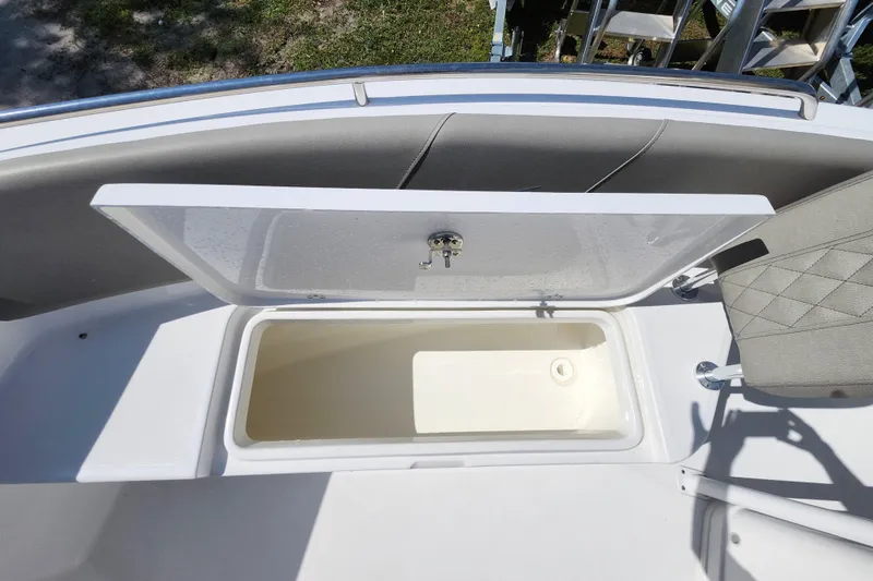 Slide: The Image of Open storage compartment on 2026 Savannah 2200 Offshore boat. - 12