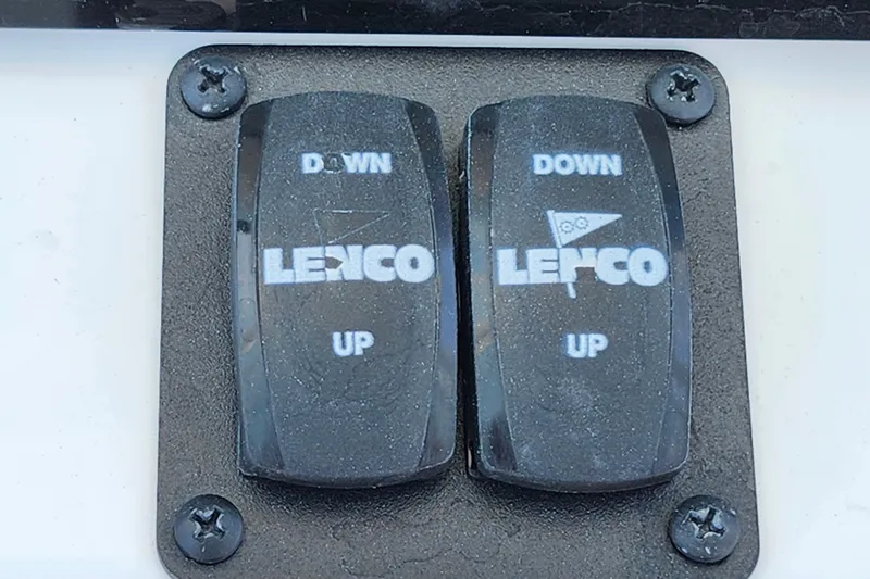 Slide: The Image of Lenco trim tab switches on a 2026 Savannah 2200 Offshore boat. - 24