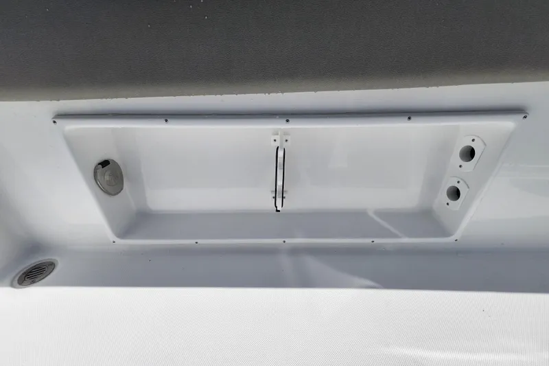 Slide: The Image of 2026 Savannah 2200 Offshore boat compartment with storage and utility features. - 27