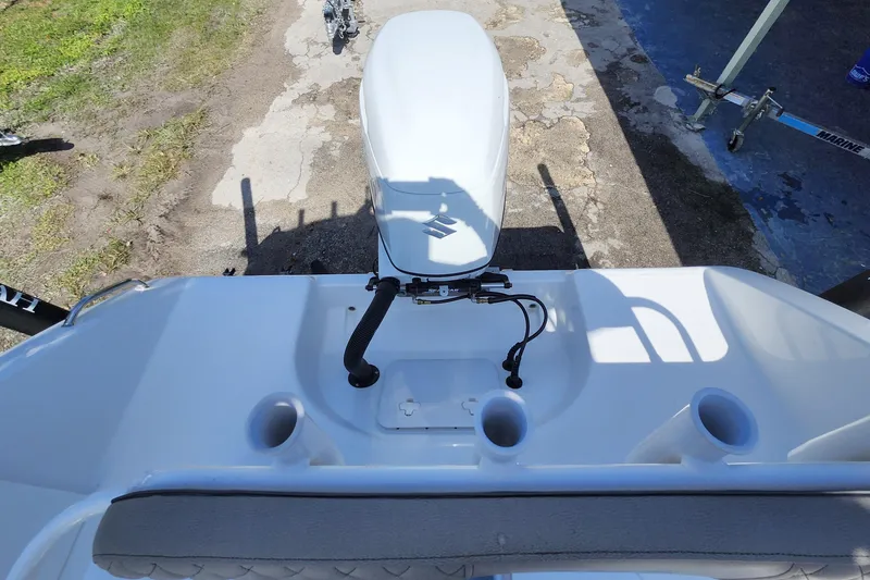 Slide: The Image of 2026 Savannah 2200 Offshore boat with outboard motor, viewed from above. - 31