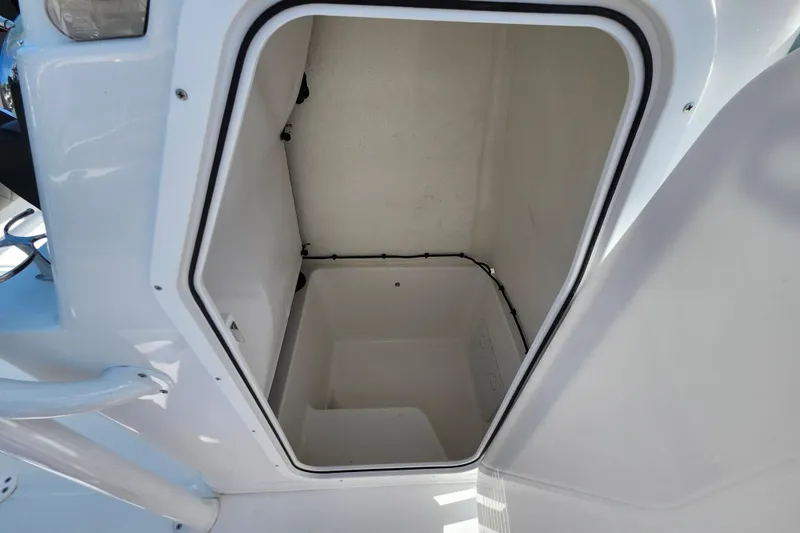 Slide: The Image of Open storage compartment on 2026 Savannah 2200 Offshore boat. - 37