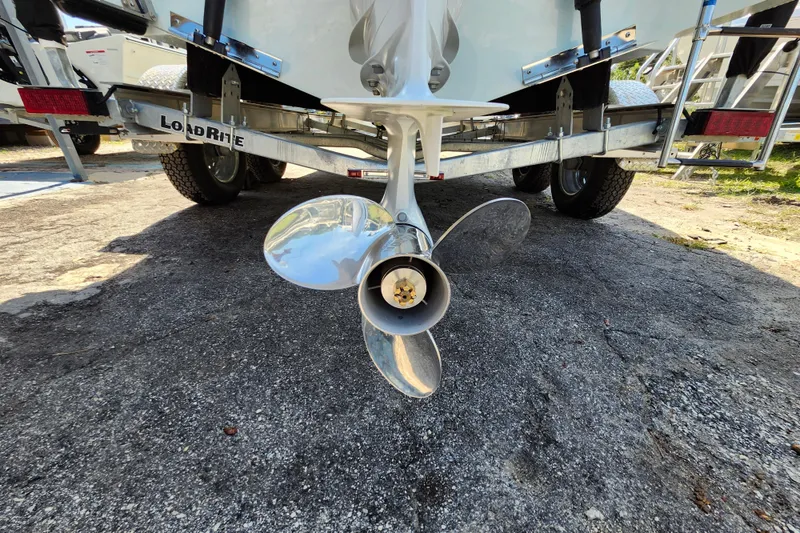 Slide: The Image of Propeller of 2026 Savannah 2200 Offshore boat on Load Rite trailer. - 38