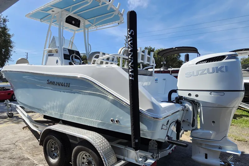 Slide: The Image of 2026 Savannah 2200 Offshore boat with Suzuki engine on trailer. - 4