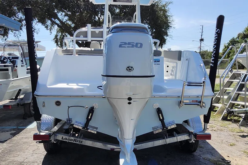 Slide: The Image of 2026 Savannah 2200 Offshore boat with powerful 250 engine on trailer. - 5