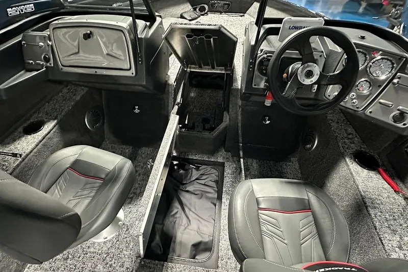 Slide: The Image of Interior of 2026 Tracker Pro Guide V-175 WT with steering wheel and seats. - 11