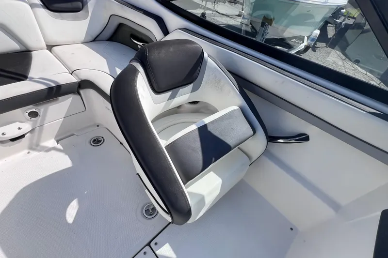 Slide: The Image of 2015 Yamaha Boats SX192 interior seating with black and white upholstery. - 15
