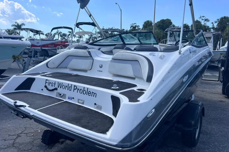 Slide: The Image of 2015 Yamaha Boats SX192 on trailer, featuring "First World Problem" text on stern. - 2