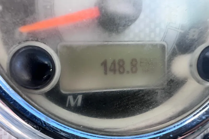 Slide: The Image of Close-up of Yamaha SX192 2015 boat gauge displaying 148.8 hours. - 33