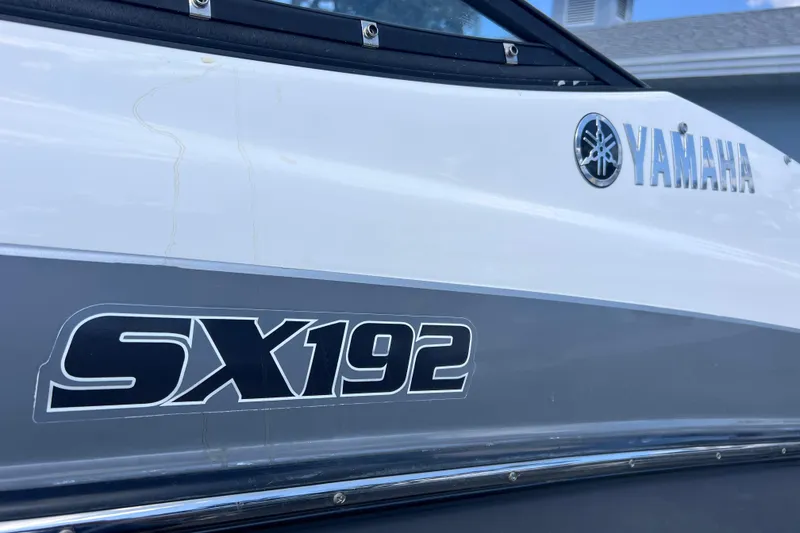 Slide: The Image of 2015 Yamaha Boats SX192 logo on boat exterior, close-up view. - 5