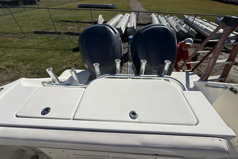 Slide: The Image of 2003 Hydra-Sports Vector 2800 WA boat with dual engines and rod holders. - 11