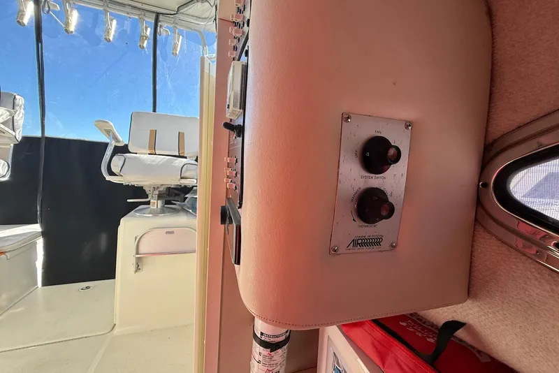 Slide: The Image of 2003 Hydra-Sports Vector 2800 WA interior with control panel and seating. - 14