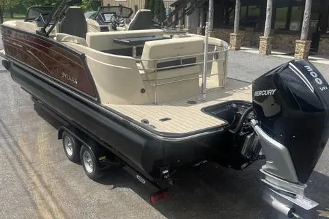 Slide: The Image of 2024 Sylvan G-3 DLZ DC boat with Mercury 300 engine on a trailer. - 6