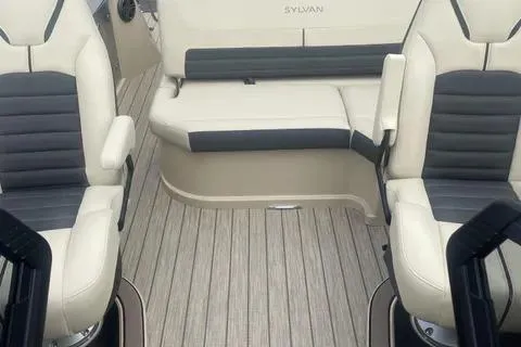 Slide: The Image of 2024 Sylvan G-3 DLZ DC boat interior with sleek seating and modern design. - 8