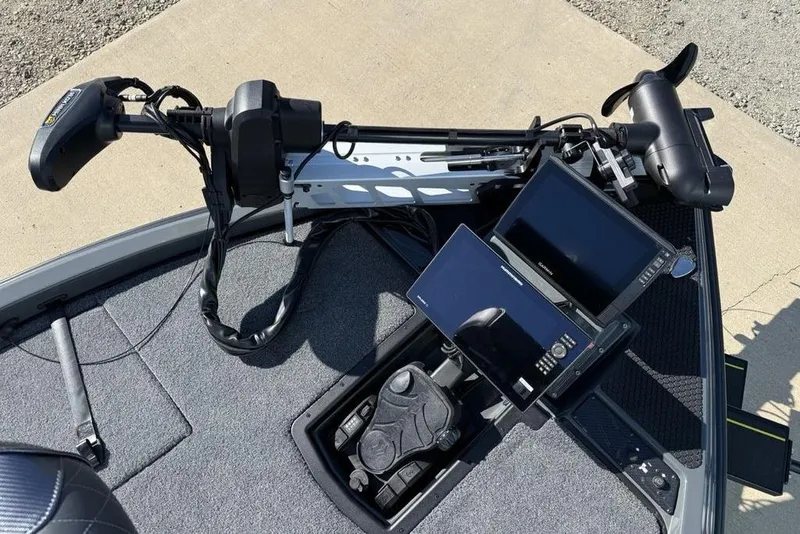 Slide: The Image of 2026 Phoenix 920 Elite X boat dashboard with advanced navigation and control systems. - 11