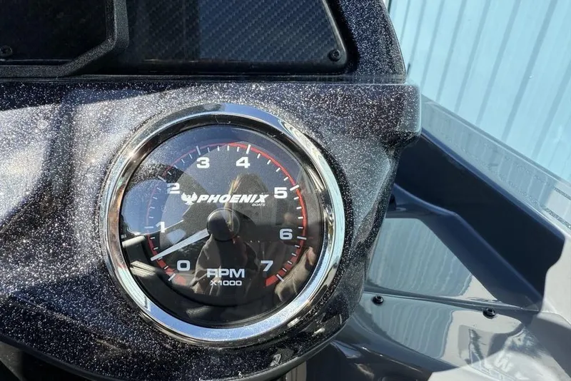 Slide: The Image of Tachometer of 2026 Phoenix 920 Elite X boat, displaying RPM gauge. - 18