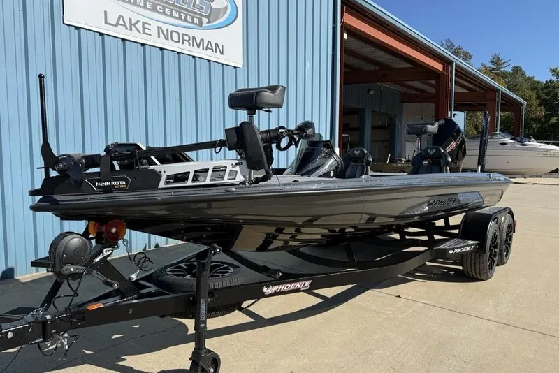 The Image of 2026 Phoenix 920 Elite X boat on trailer at Lake Norman Marine Center. - 2