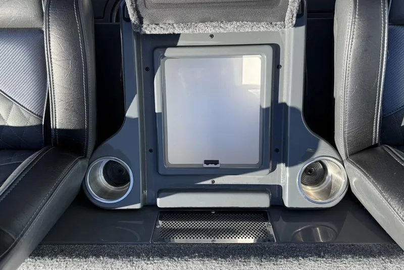 Slide: The Image of Interior of 2026 Phoenix 920 Elite X with cup holders and storage compartment. - 27