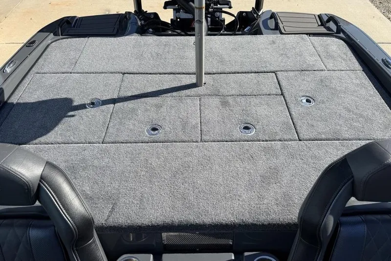 Slide: The Image of 2026 Phoenix 920 Elite X boat deck with gray carpet and seating. - 31