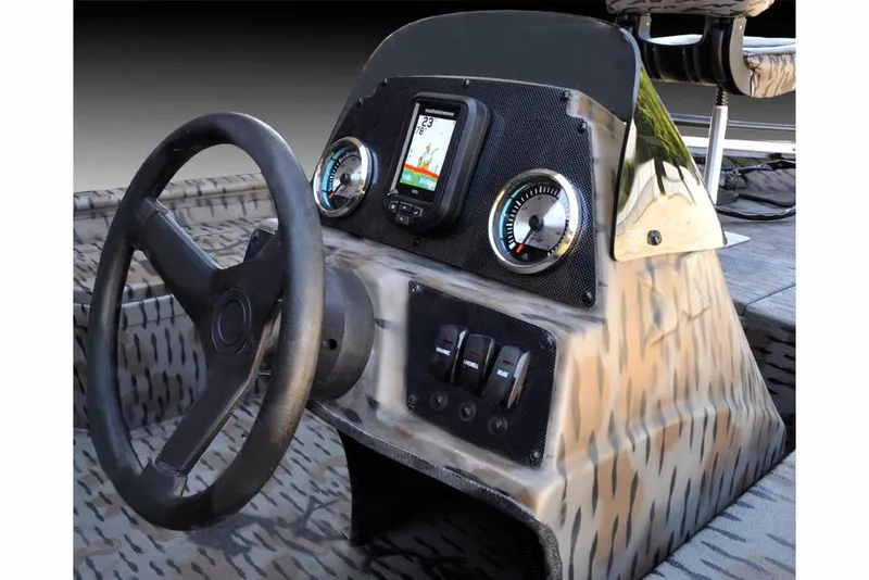 Slide: The Image of 2019 Xpress XP180 boat dashboard with steering wheel and gauges. - 7