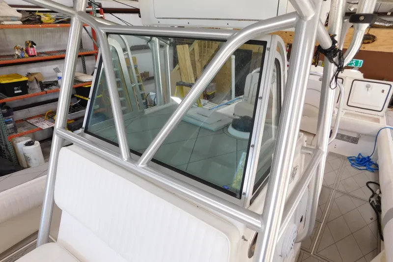 Slide: The Image of 2003 Regulator 32 Center Console boat interior with aluminum frame and seating. - 33