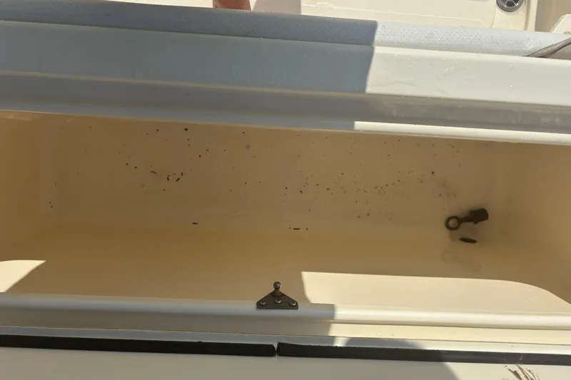 Slide: The Image of Open storage compartment on a 2006 Scout 282 Sportfish boat. - 22