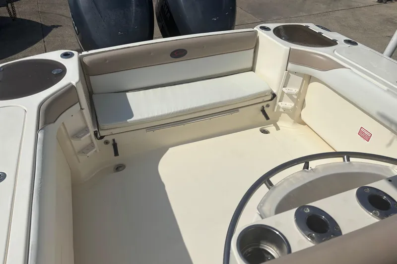 Slide: The Image of 2006 Scout 282 Sportfish boat interior with seating and cup holders. - 7