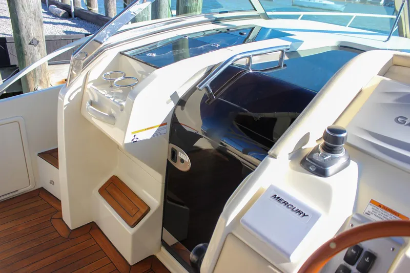 Slide: The Image of Luxurious 2017 Chris-Craft Launch 38 boat seats with blue and cream upholstery. - 38