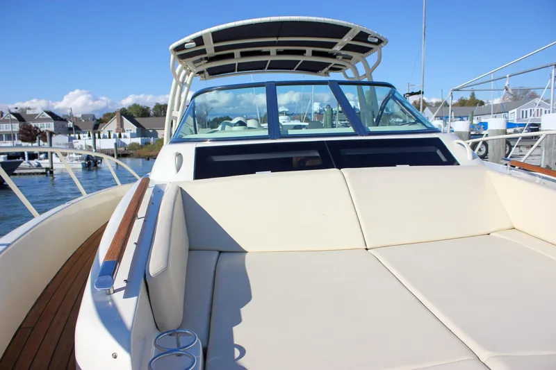 Slide: The Image of 2017 Chris-Craft Launch 38 yacht on calm waters under clear blue sky. - 47