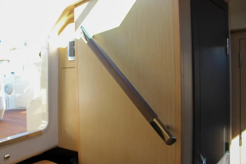 Slide: The Image of Shower area inside 2017 Chris-Craft Launch 38 boat, featuring modern fixtures. - 71