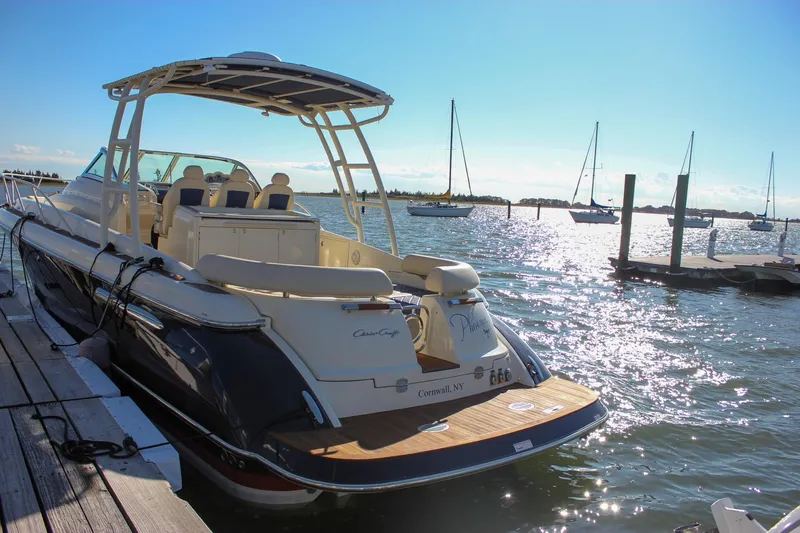 Slide: The Image of 2017 Chris-Craft Launch 38 interior with modern wooden stairs and cozy cabin. - 78